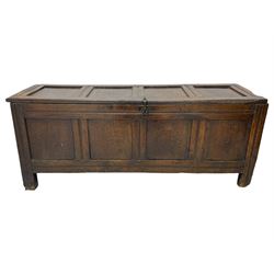 17th century panelled oak blanket chest or kist, quadruple panelled hinged lid over quadruple panelled front, moulded frame and pegged construction, on stile supports