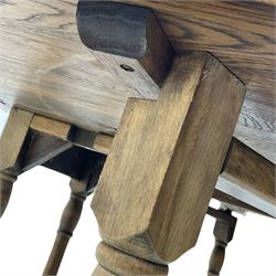 Mid-to-late 20th century oak and beech drop-leaf dining table, gate-leg action base with turned supports