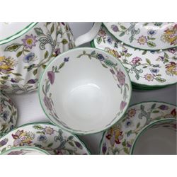 Minton Haddon Hall pattern tea service for twelve place settings, to include teapot, sugar bowl, milk jug, twelve cups and saucers and twelve dessert plates (39)