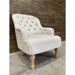 Armchair upholstered in button back linen fabric