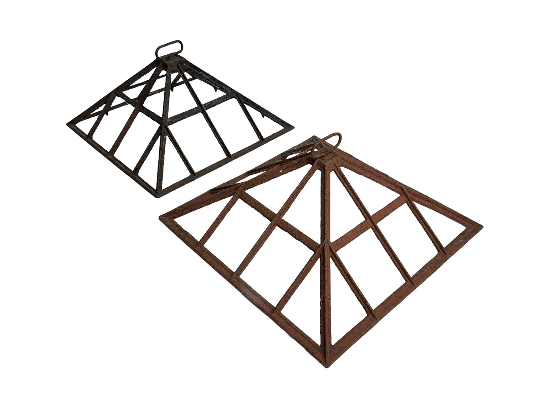 Two 19th century cast iron cloche lid frames, pyramid form with astragal frame, with carrying handle