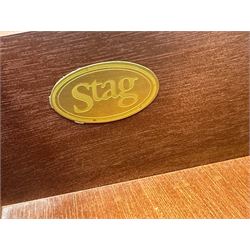 Stag Minstrel - mahogany chest of drawers, rectangular top over three drawers with brass ring pulls, on bracket feet