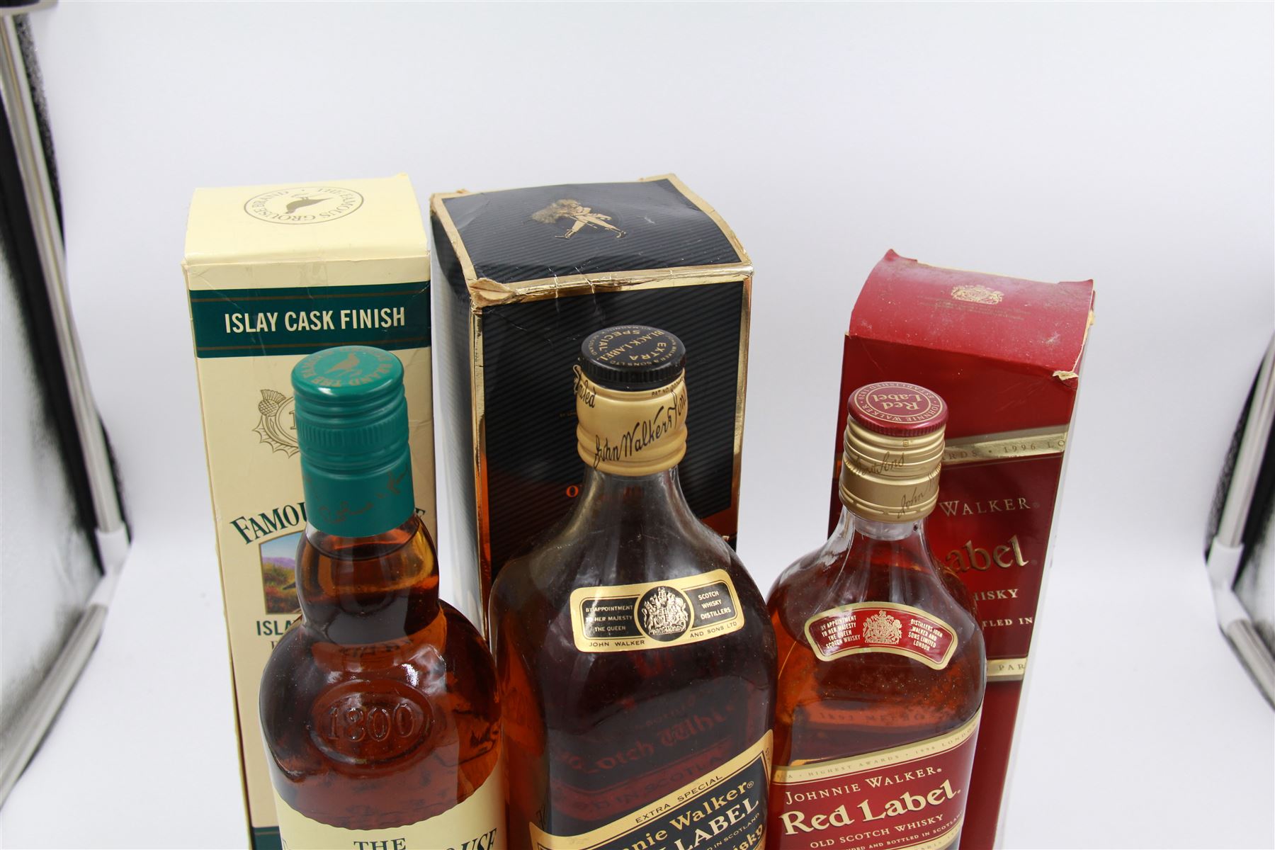 The Famous Grouse, Islay cask finished blended Scotch whisky 70cl 40%, Johnnie Walker, Black Label extra special blended Scotch whisky, 1L 43% and Johnnie Walker Red Label 75cl 40% (3) 