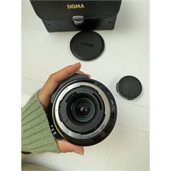 Sigma Mirror-Telephoto Multi-Coated 1:8 f=600mm camera lens, serial no. 222684, with two lens caps, hood, filters, instruction booklet and case