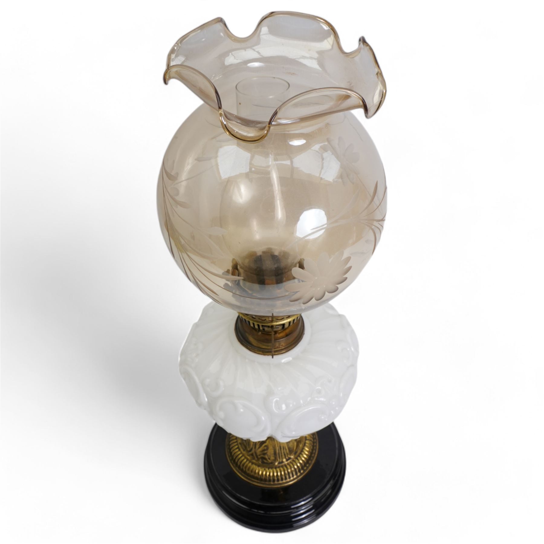 19th/ early 20th century brass oil lamp with opaque glass reservoir and black base, H54cm