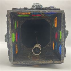 20th Century Arts & Crafts wrought iron porch lantern, in the manner of Peter Marsh, modelled as a house set with coloured resin panels, H38cm