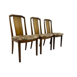 G-Plan -  1970s teak extending dining table, pull-out extending action with fold-out leaf, rectangular end supports on sledge feet united by stretcher (100cm x 160cm - 205cm, H73cm); set of six dining chairs, chevron-patterned backrests upholstered with floral patterned fabric, on tapered legs, H89cm