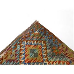 Chobi kilim multi-coloured rug, the field decorated with various lozenges of contrasting colours with ivory outlines, enclosed by a guard band with repeating geometric patterns