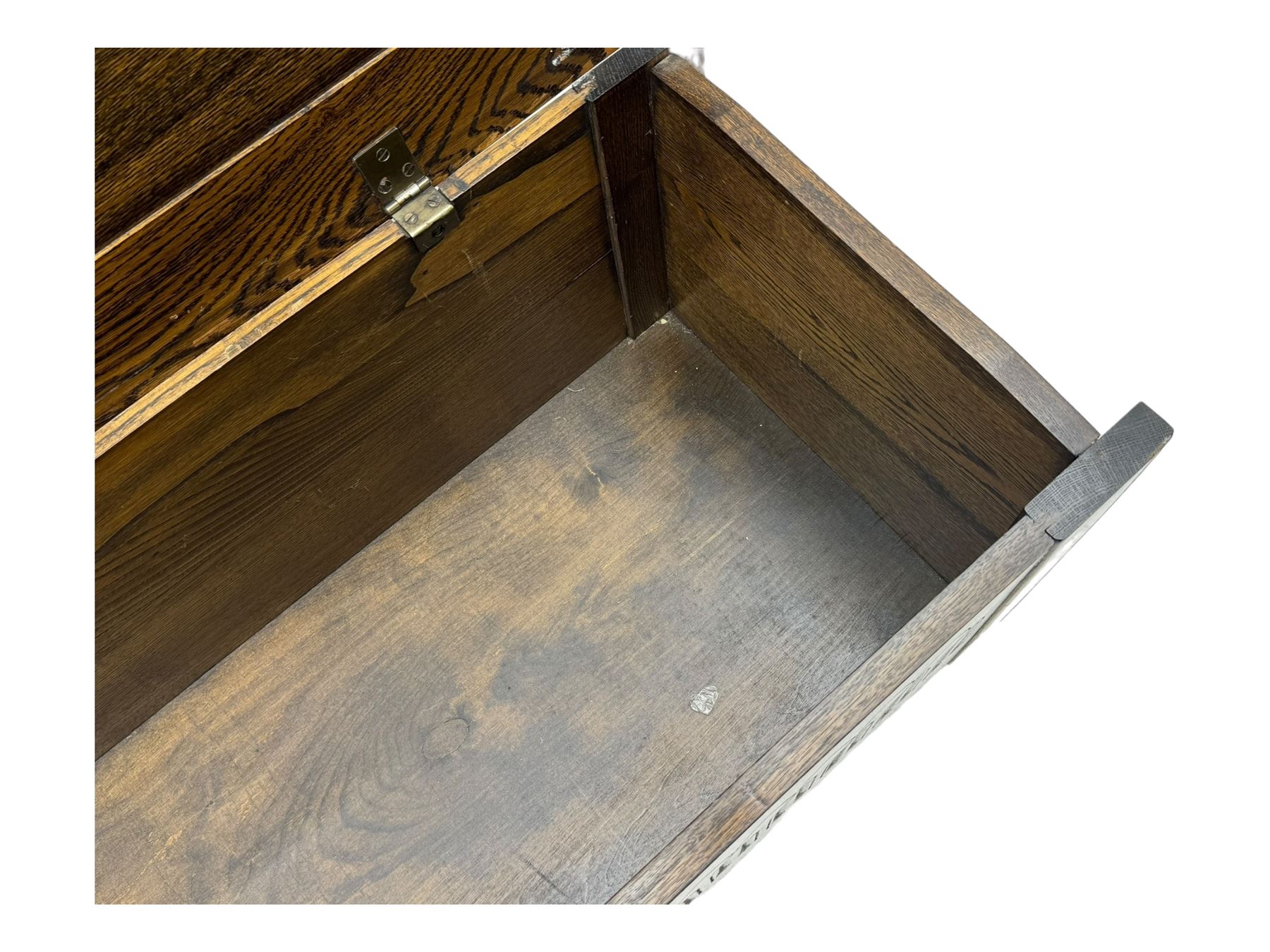 20th century oak coffer or blanket chest, rectangular hinged top over repeating Gothic arch carved front and shaped sides, constructed with pegged joints, on stile supports