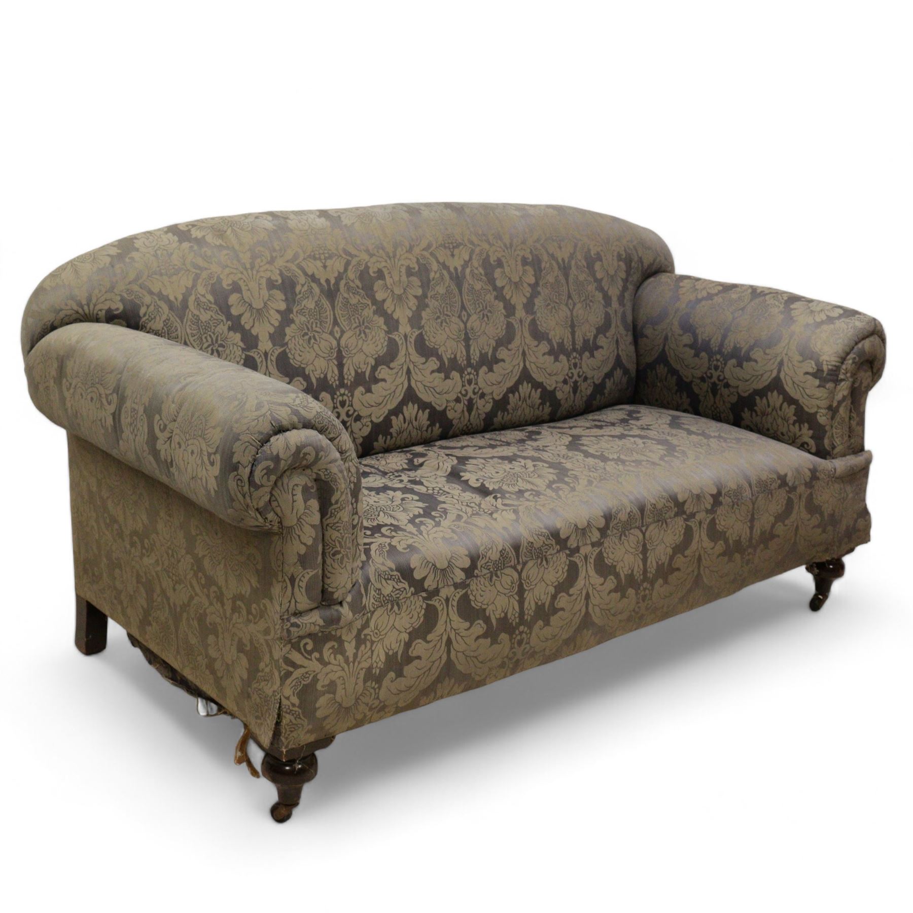 Late Victorian mahogany framed two seat drop arm sofa, upholstered in floral pattern fabric