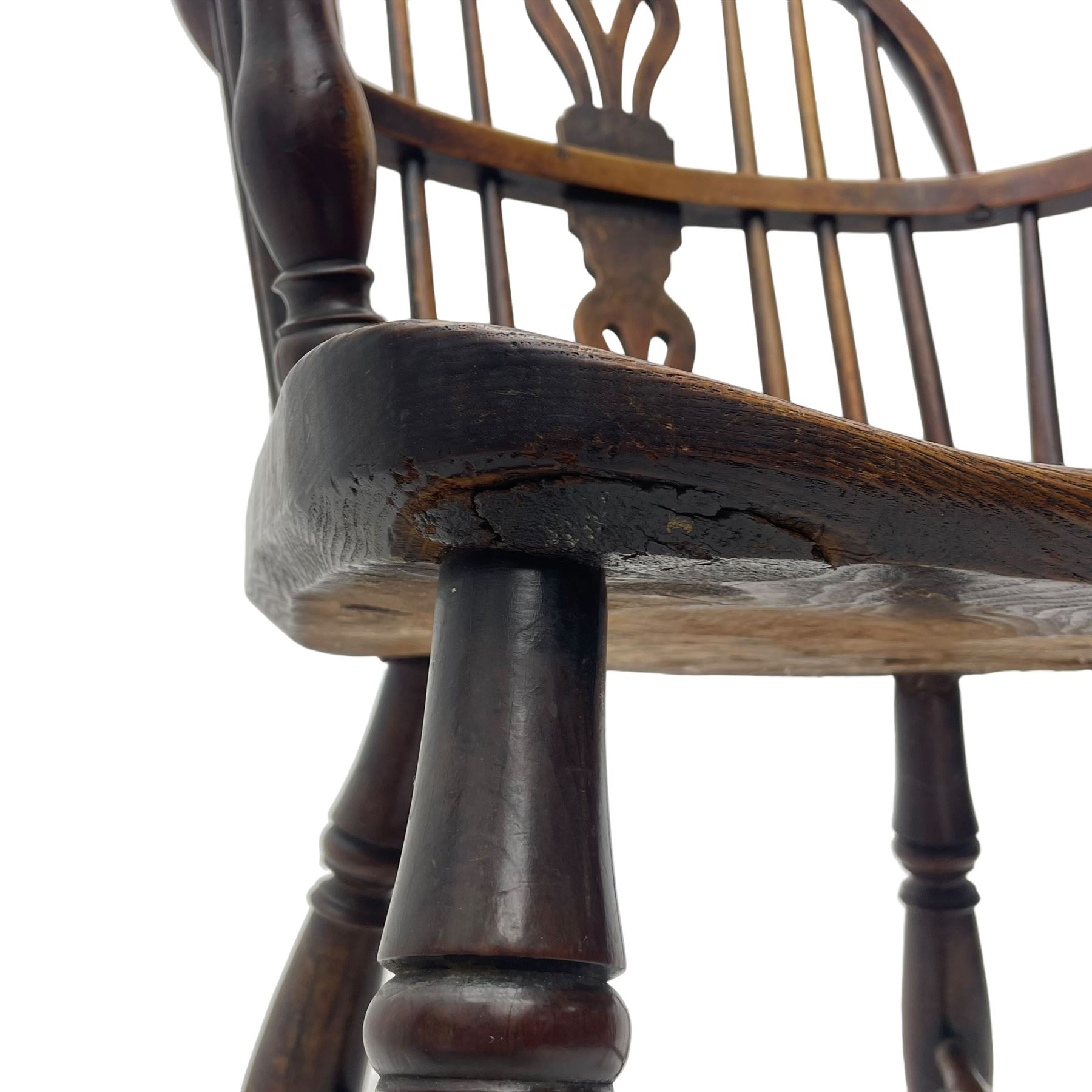 19th century yew wood and elm Windsor armchair, low double hoop stick and pierced splat back, dished seat on turned supports united by crinoline stretchers