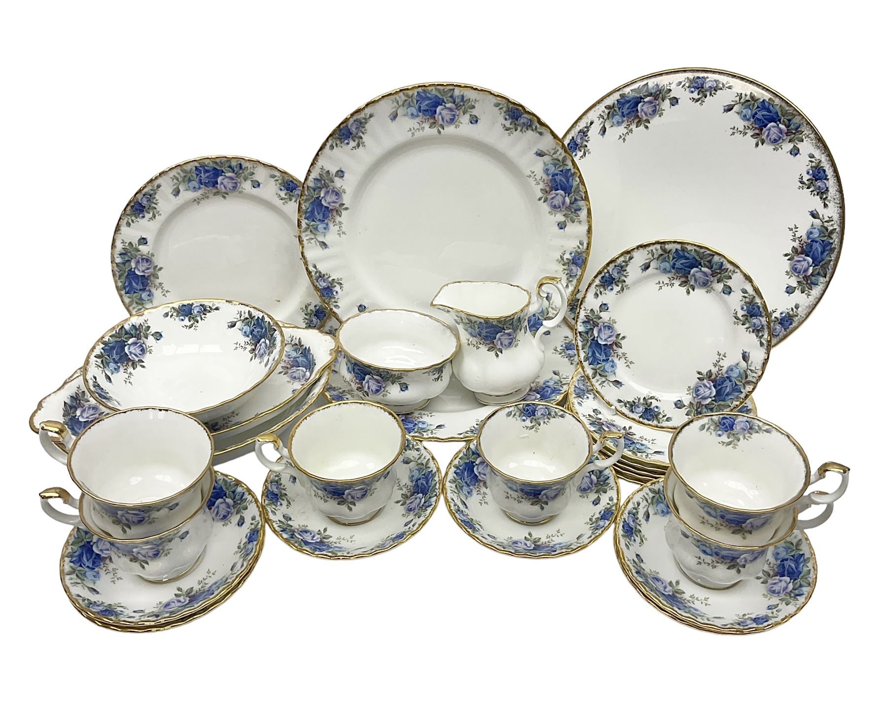 Royal Albert Moonlight Rose pattern tea service for six, comprising teacups and saucers, open sucrier, milk jug, dessert plates and cake plate, together with six other dinners wares in the same pattern