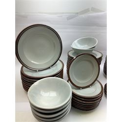 20th century celadon dinner service with iron rim, comprising nineteen dinner plates 26.5cm, twenty-four side plates D24cm, twelve varying bowls, twenty-two tea plates and fifteen saucers 