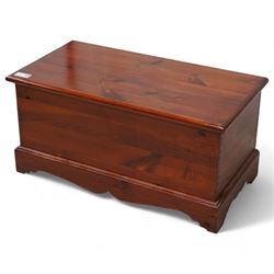 Stained pine blanket box, enclosed by hinged lid, moulded plinth base 