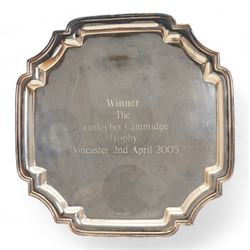 'Winner The Stanleybet Cammidge Trophy Doncaster 2nd April 2005' - A square salver with indented corners raised on scroll feet 30cm Birmingham 1996 Maker Victoria Silverware Ltd