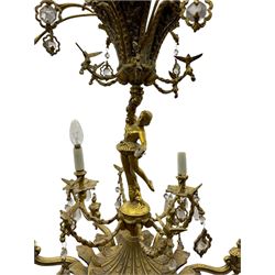 Gilt metal six branch ceiling light, the central stem modelled as a ballerina, decorated with glass pendants 