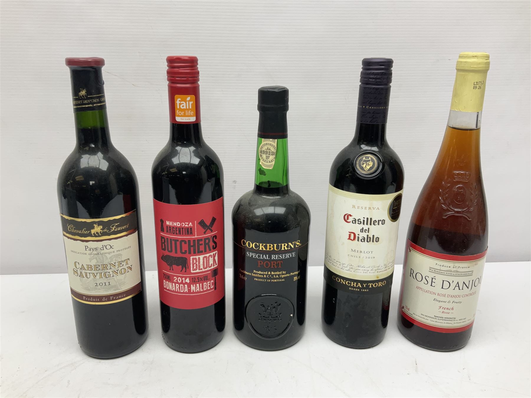 Mixed alcohol, including Cockburn's special reserve port, Casillero del Diablo Merlot, etc