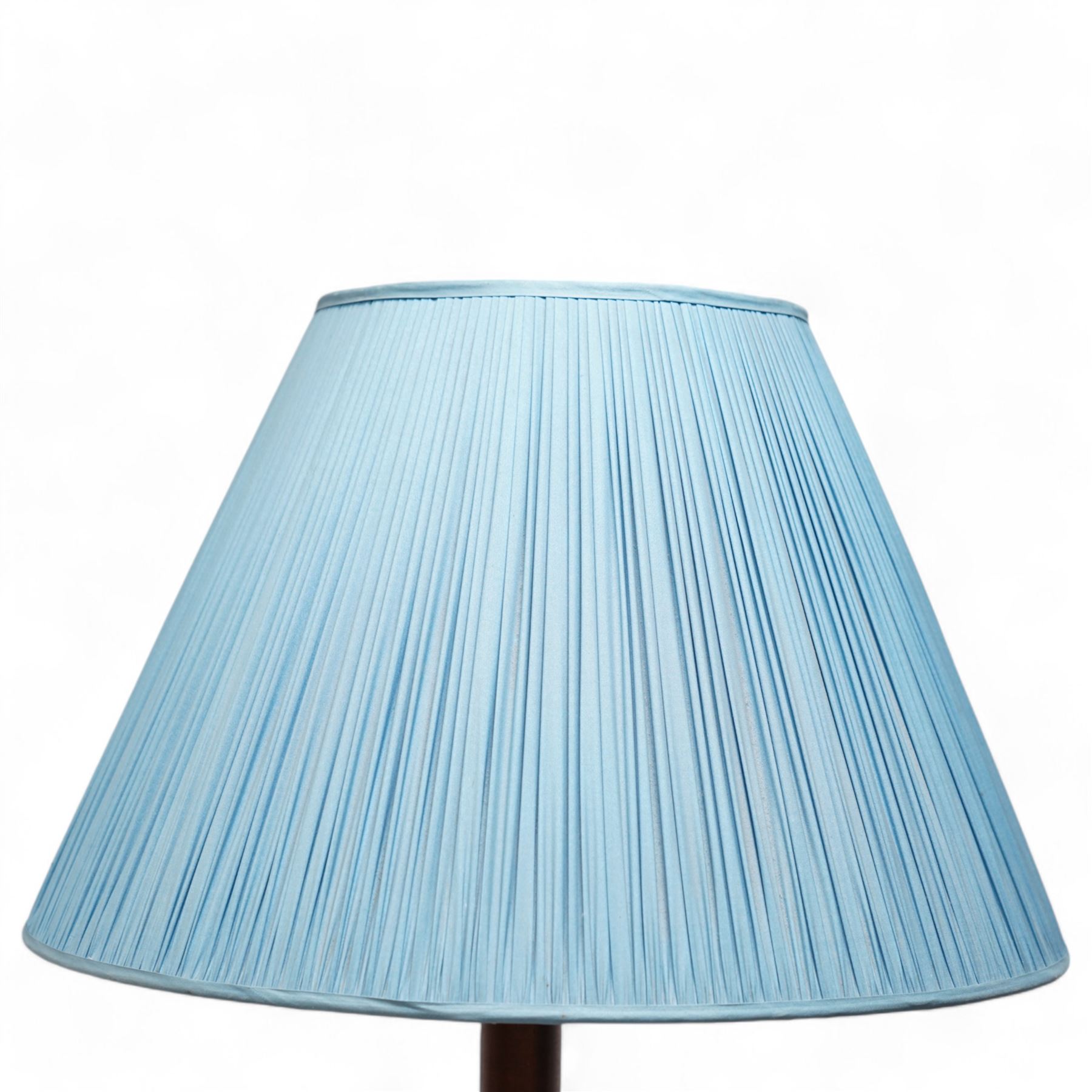 Hardwood simulated bamboo standard lamp, on stepped circular base, with blue pleated shade 