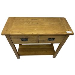 Light oak console table, rectangular top over two drawers, on rectangular supports united by under-tier