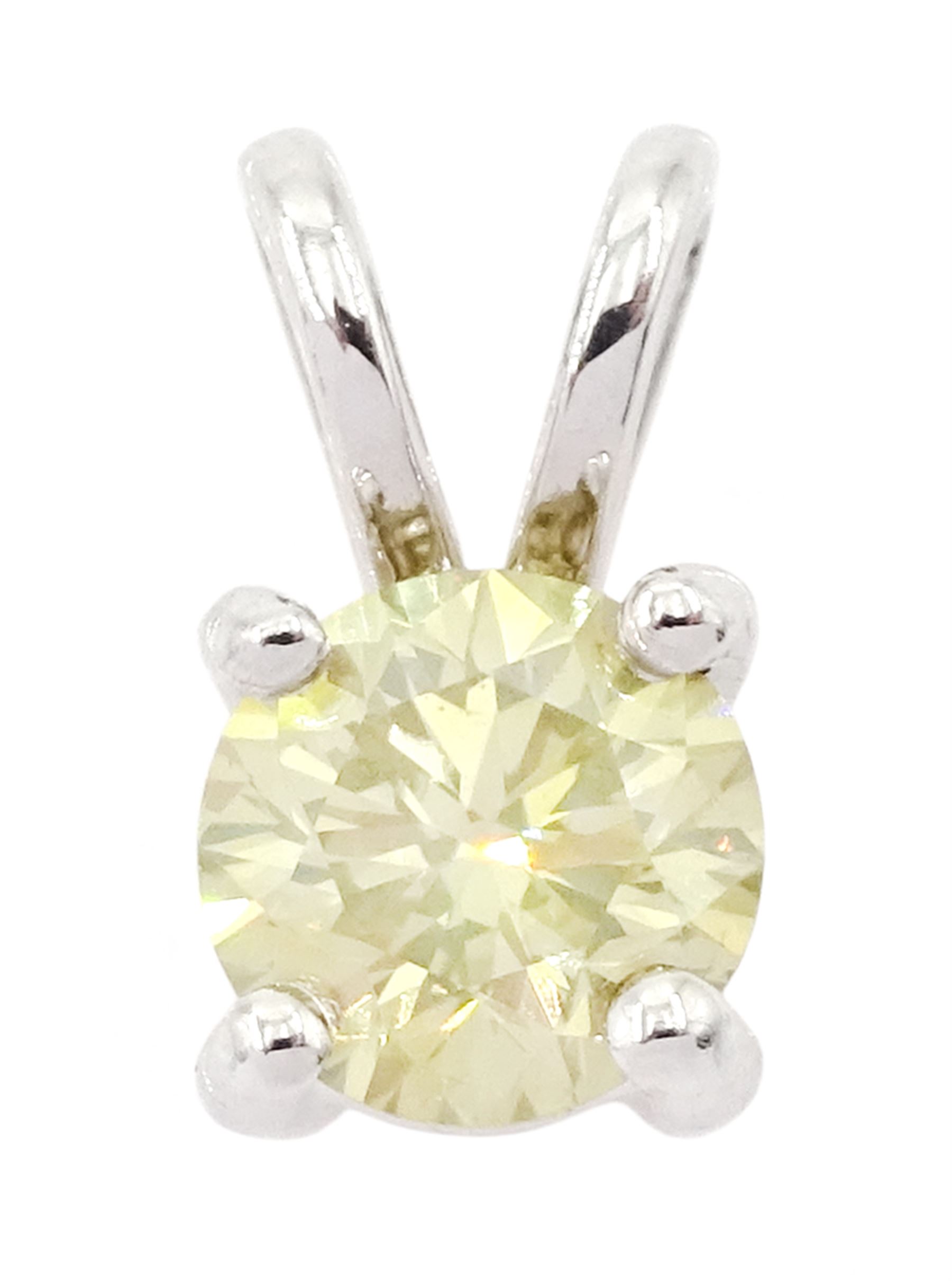 18ct white gold fancy yellow diamond pendant, diamond 0.61 carat, with World Gemological Institute report