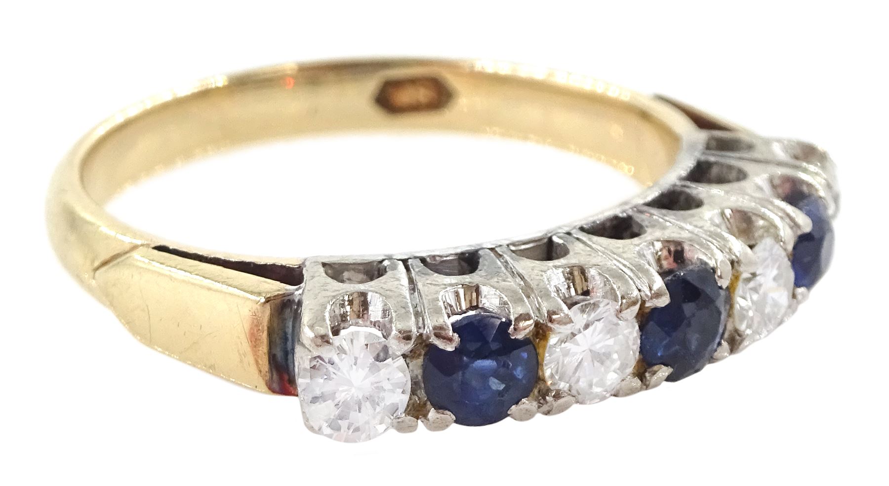 Gold and silver seven stone round brilliant cut diamond and sapphire ring, total diamond weight approx 0.40 carat