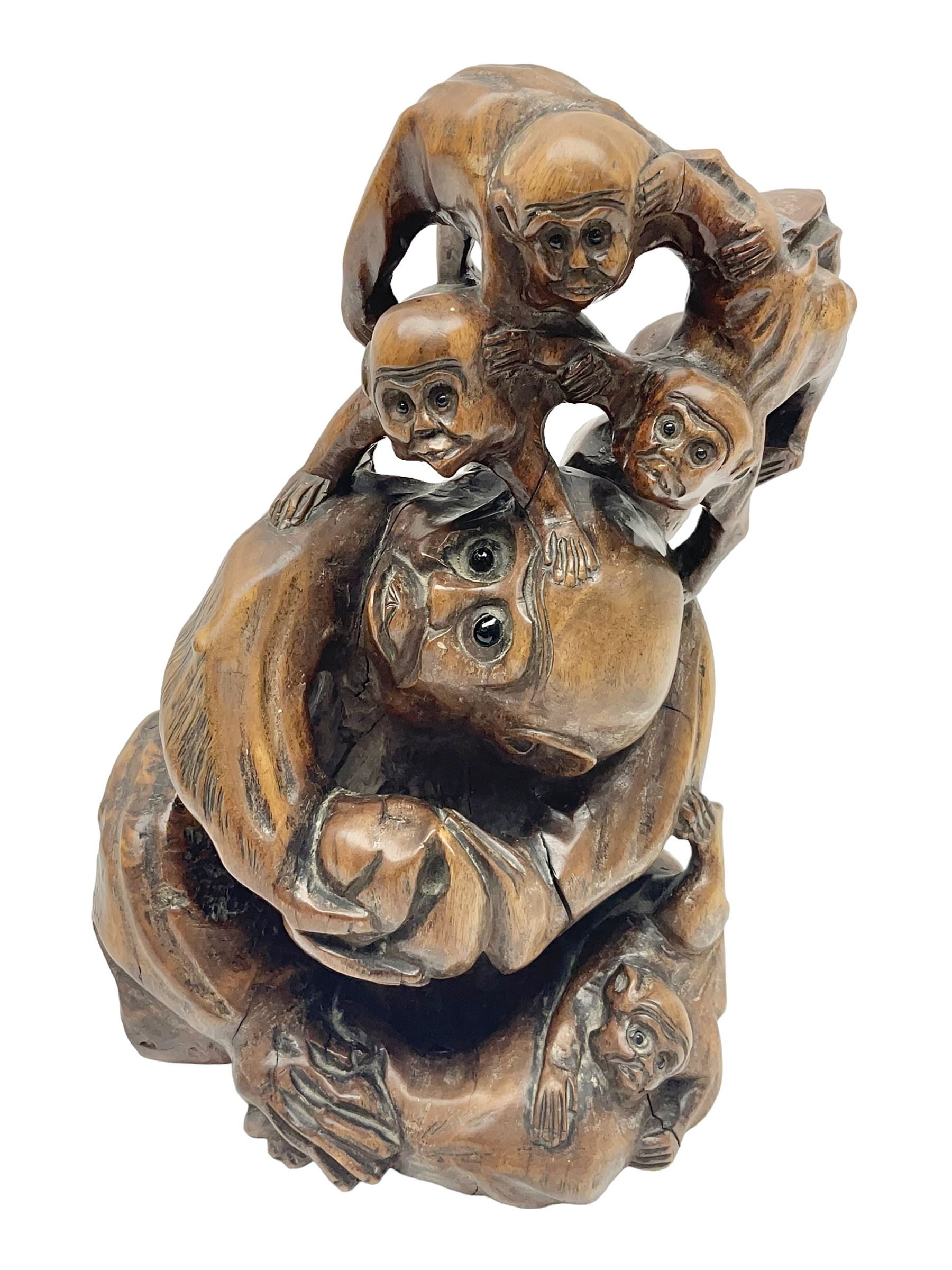 Chinese root carving, modelled as a large monkey family, with inset eyes, H25cm