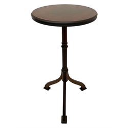 Early 20th century mahogany wine table, figured circular top with reeded edge, on turned and reed moulded stem, three reeded tapered supports on rectangular moulded pad feet 