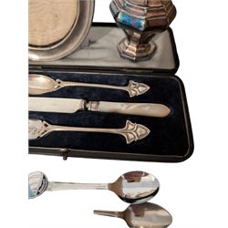 Silver photograph frame and a silver mustard spoon, both hallmarked, together with an Egyptian silver box, silver plated Walker & Hall christening set, silver plated sugar caster, silver plated coffee bean spoons, and silver plated pepper and salt shaker