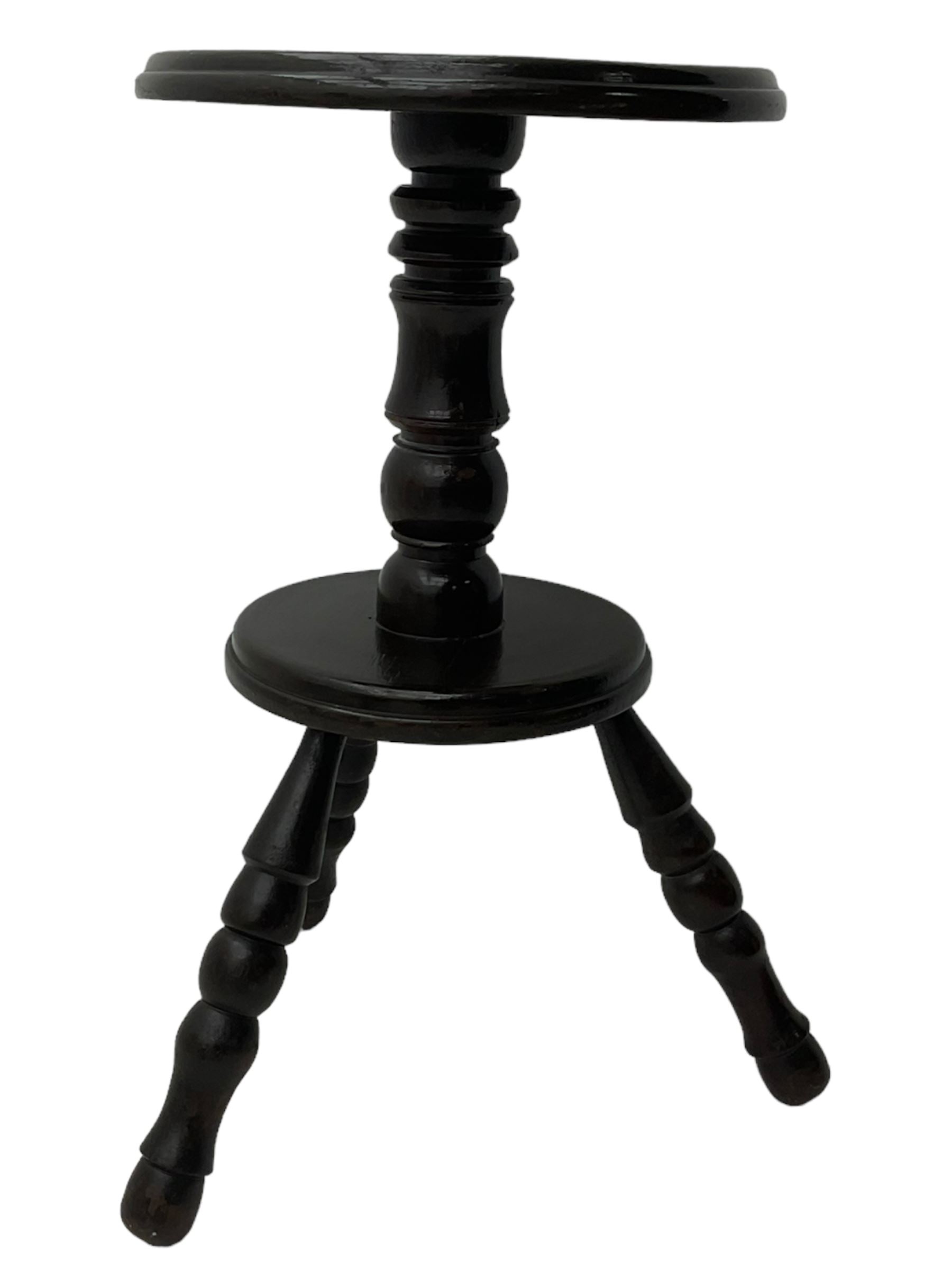 20th century 'primitive' design three-legged cricket table, circular moulded top on turned pedestal, circular moulded low platform over three turned and splayed supports 