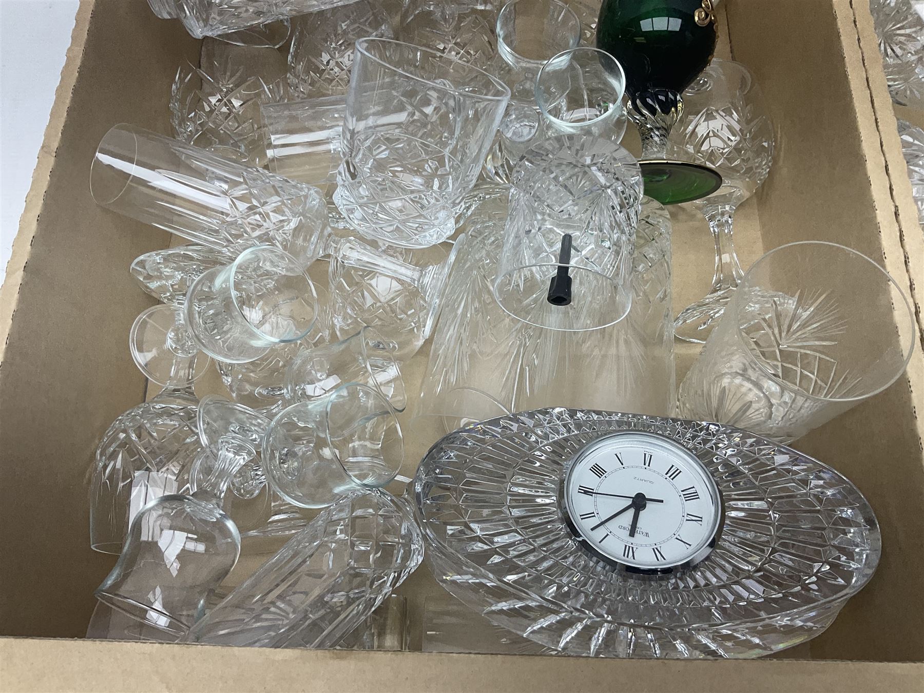 Quantity of crystal and glass ware, to include drinking glasses, Waterford crystal mantel clock, decanter, etc, in two boxes 