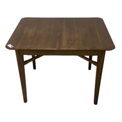 Mid-20th century teak extending dining table, rectangular top with rounded corners, raised on shaped tapering supports united by X-stretcher, with additional leaf