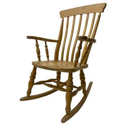 Farmhouse style beech rocking chair, shaped cresting rail on vertical slats, on turned front supports joined by swell-turned double H stretcher base