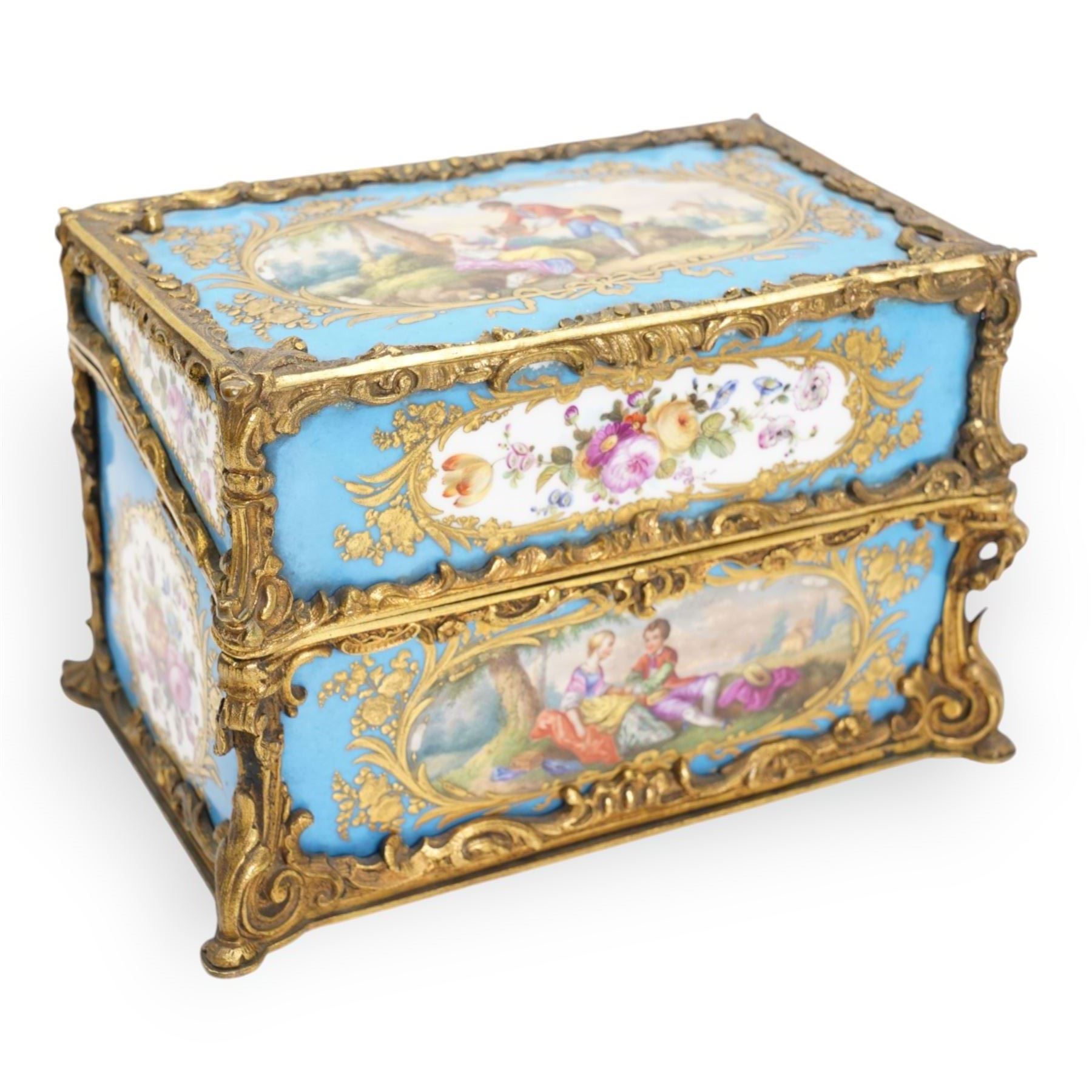 19th century Sevres style porcelain and gilt brass casket, the fall front hinged cover painted with a courting couple in a landscape within raised gilt border on on a bleu celeste ground, the side panels depicting floral sprays and a further courting couple, within gilt brass scroll borders, L20cm x H12.5cm 