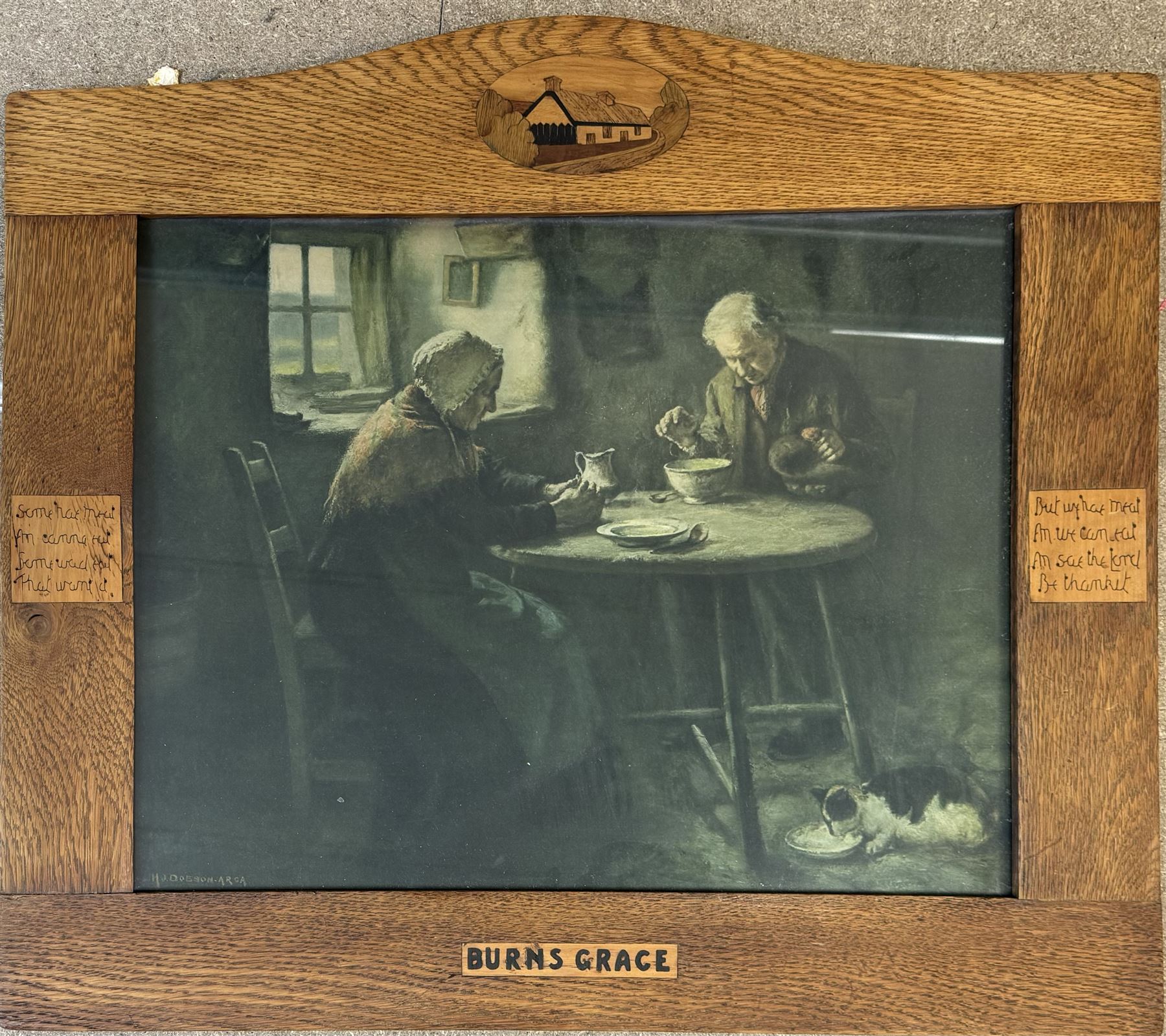 Arts and Crafts Motto frame, circa 1900, inlaid with an oval plaque depicting a cottage, two inlaid motto panels with title inlaid below 