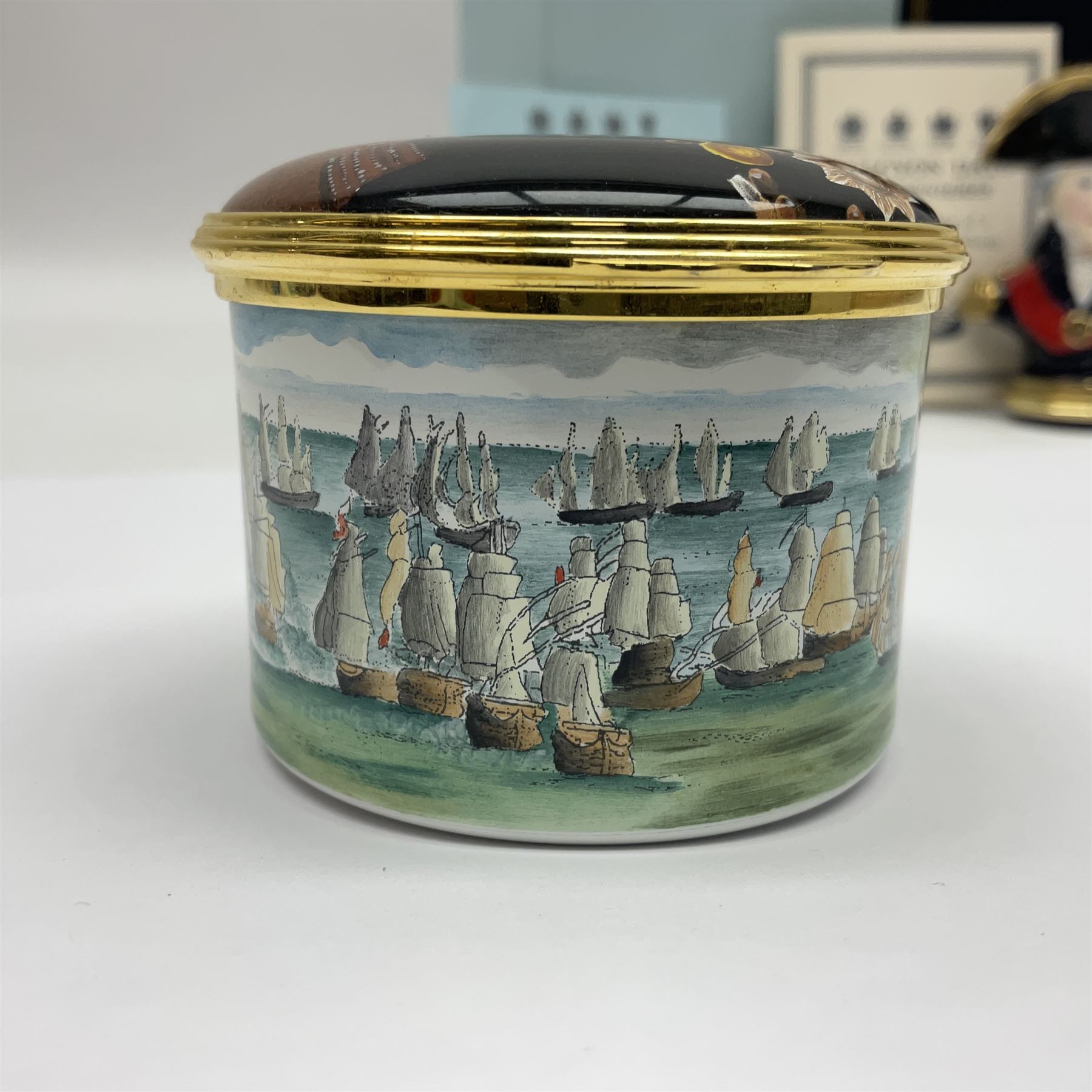 Halcyon Days bonbonniere, modelled as 'Vice-Admiral Lord Nelson', to mark the bicentenary of the British victory at the Battle of Trafalgar, together with another Halcyon Days enamel box depicting Lord Nelson, both boxed 