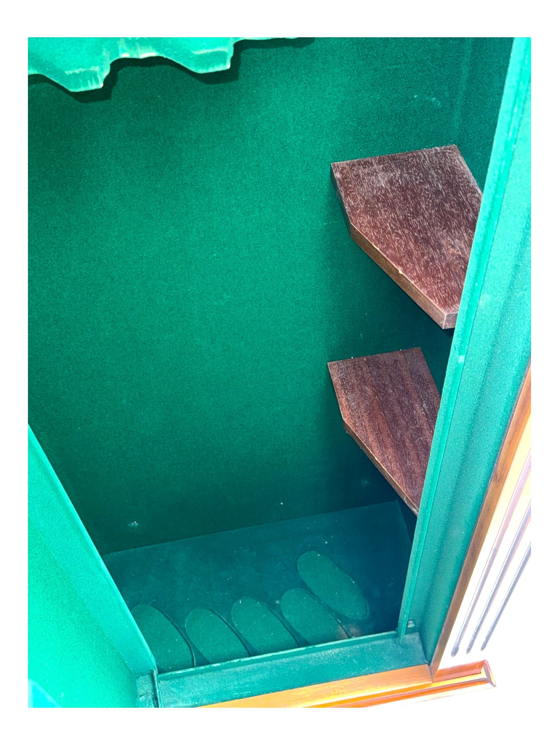 21st century steel lined gun cabinet, modelled as a Wellington chest of yew wood, to hold six long guns, interior lined with green baize, three storage shelves, with keys and bolts 