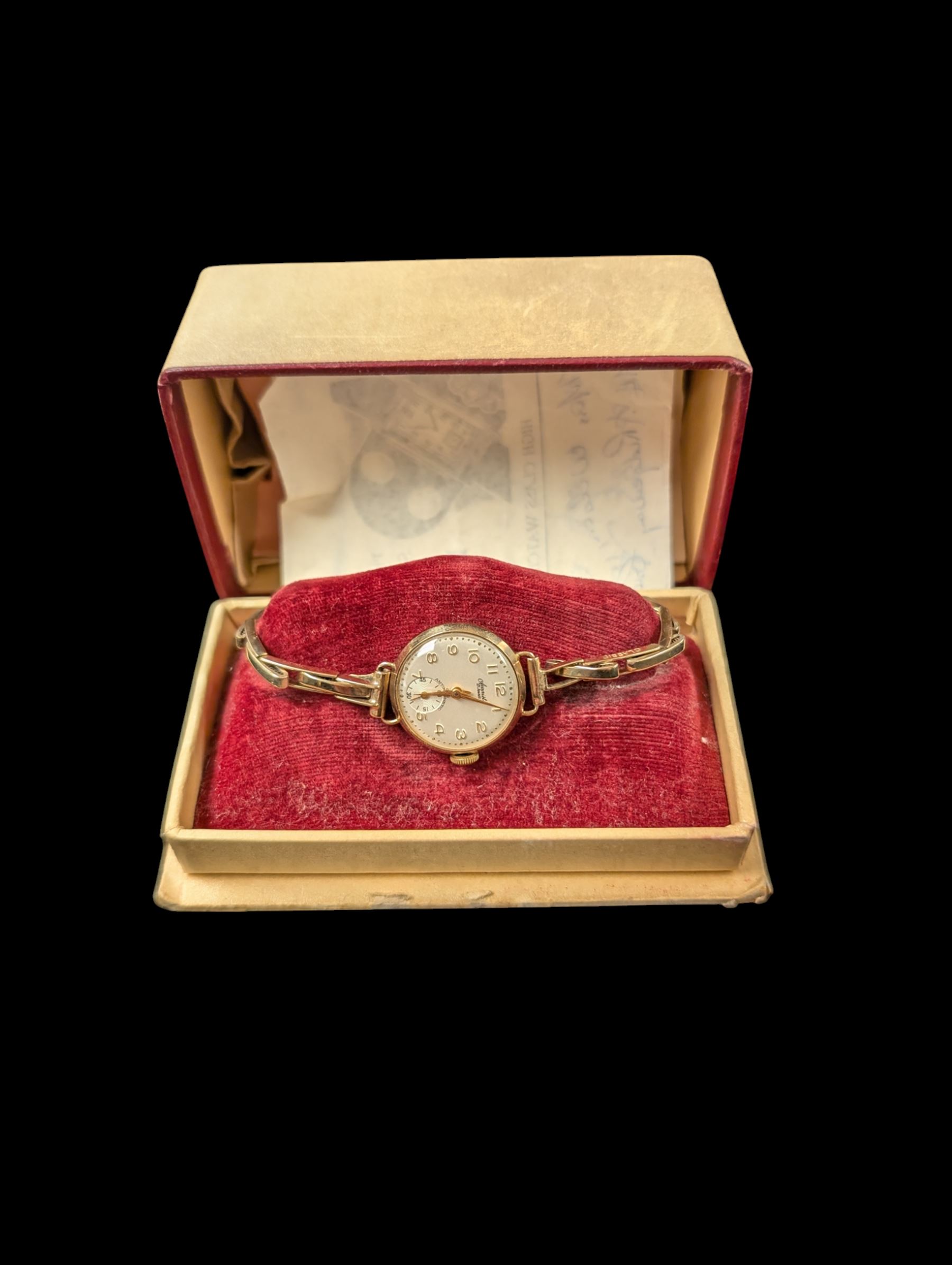 9ct gold cased manual wind ladies Accurist 21 Jewel wristwatch on a 9ct gold spring loaded, boxed 