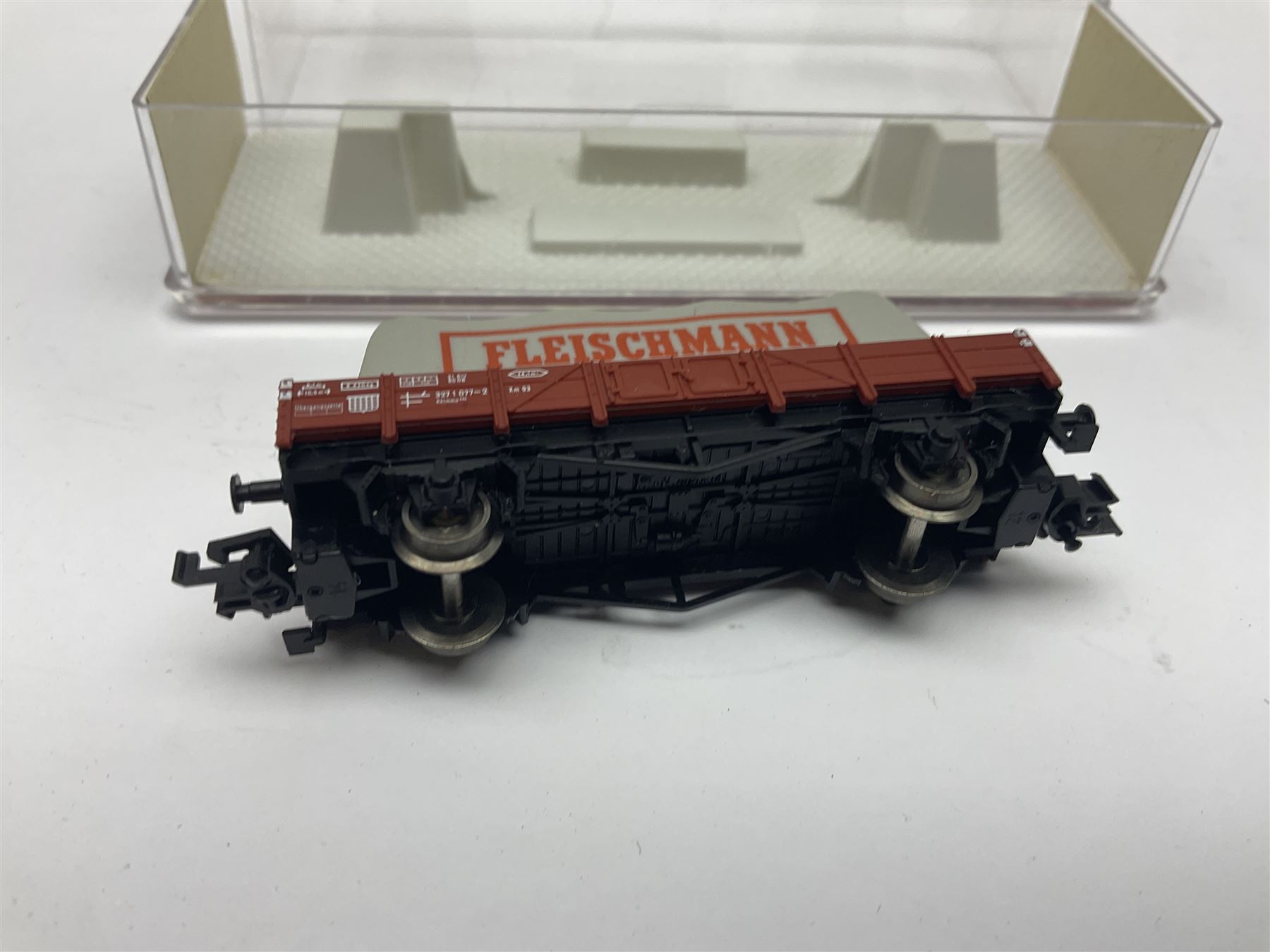 Fleischmann ‘N’ gauge ‘Piccolo’ - sixteen carriages, wagons and cars comprising nos. 8051, 8052, 8055, 8064, 8119K, 8127, 8128, 8129, 8202, 8211, 8224, 8240, 8281, 8301, 8500, 9372; along with Minitrix N503 Shock Van and 13576 6 ton Mineral Wagon; boxed and loose (18) 