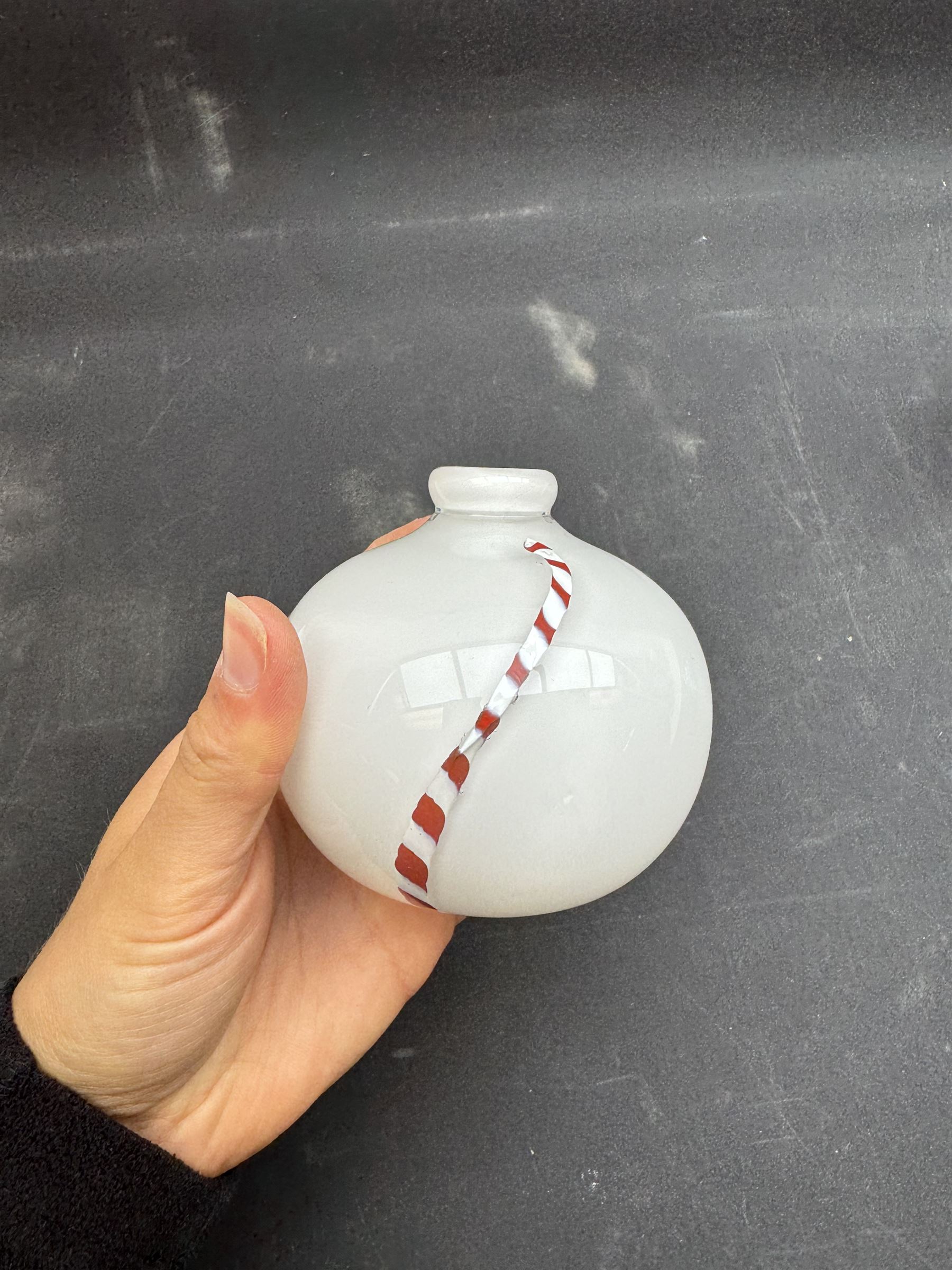 Milk glass decanter, modelled as a moon with a painted face, together with glass animals modelled as a polar bear, turtle and badger, together with other glass  