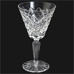 Suite of Waterford Tyrone pattern crystal to include six water goblets, H18cm, six red wine glasses, H17cm, seven white wine glasses, H16cm, six champagne flutes H18cm, six port glasses H14cm, nine champagne coupes, eight tumblers, six dessert bowls and serving/ fruit bowl