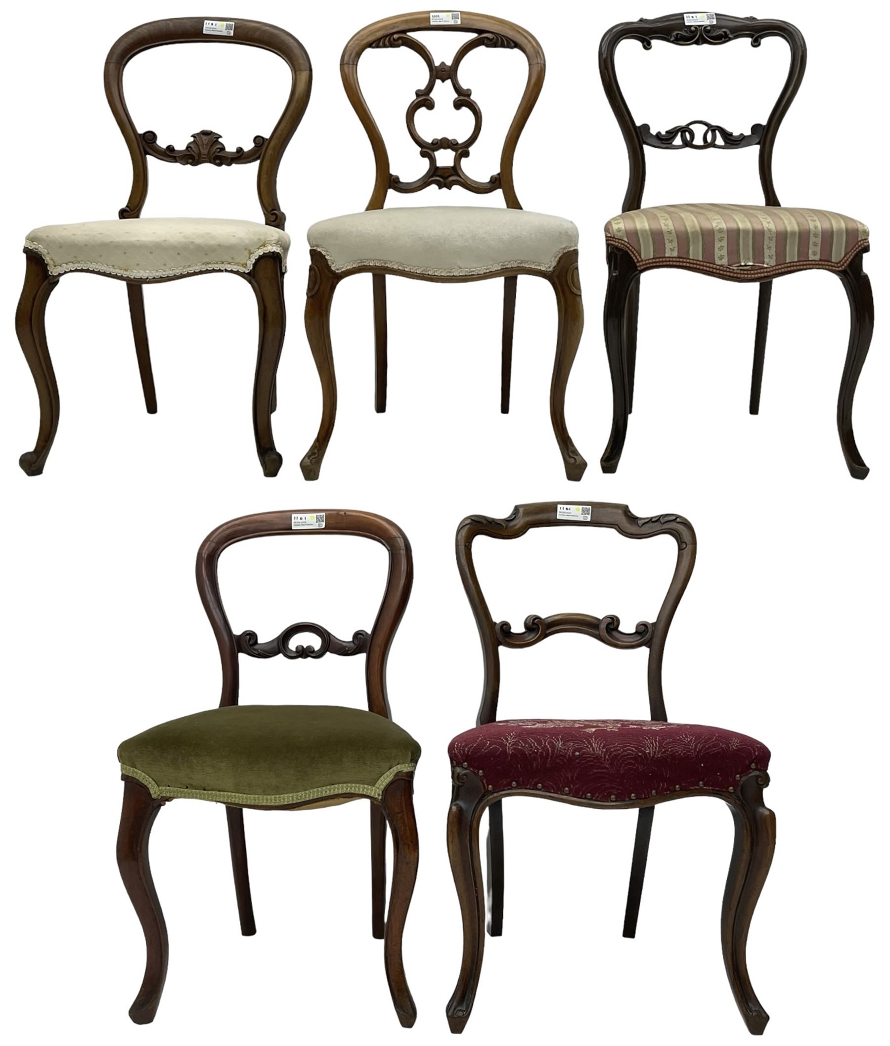 Mixed set of five Victorian chairs - Victorian rosewood dining chair with foliage carved cresting rail; Victorian mahogany balloon back dining chair with foliage carved middle rail; Victorian walnut balloon back dining chair with C-scrolled back; Victorian walnut dining chair with ring and curled leaf carved middle rail; Victorian mahogany balloon back dining chair with C-scroll and foliage carved middle rail (5)