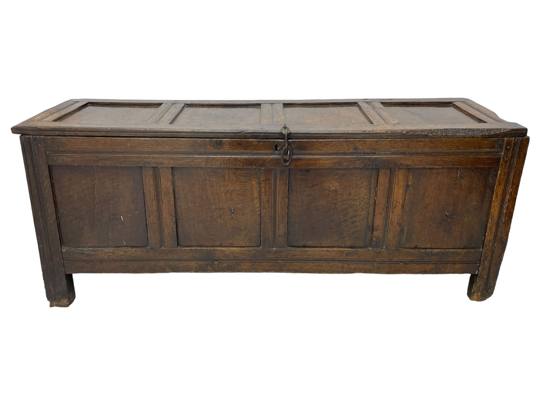 17th century panelled oak blanket chest or kist, quadruple panelled hinged lid over quadruple panelled front, moulded frame and pegged construction, on stile supports