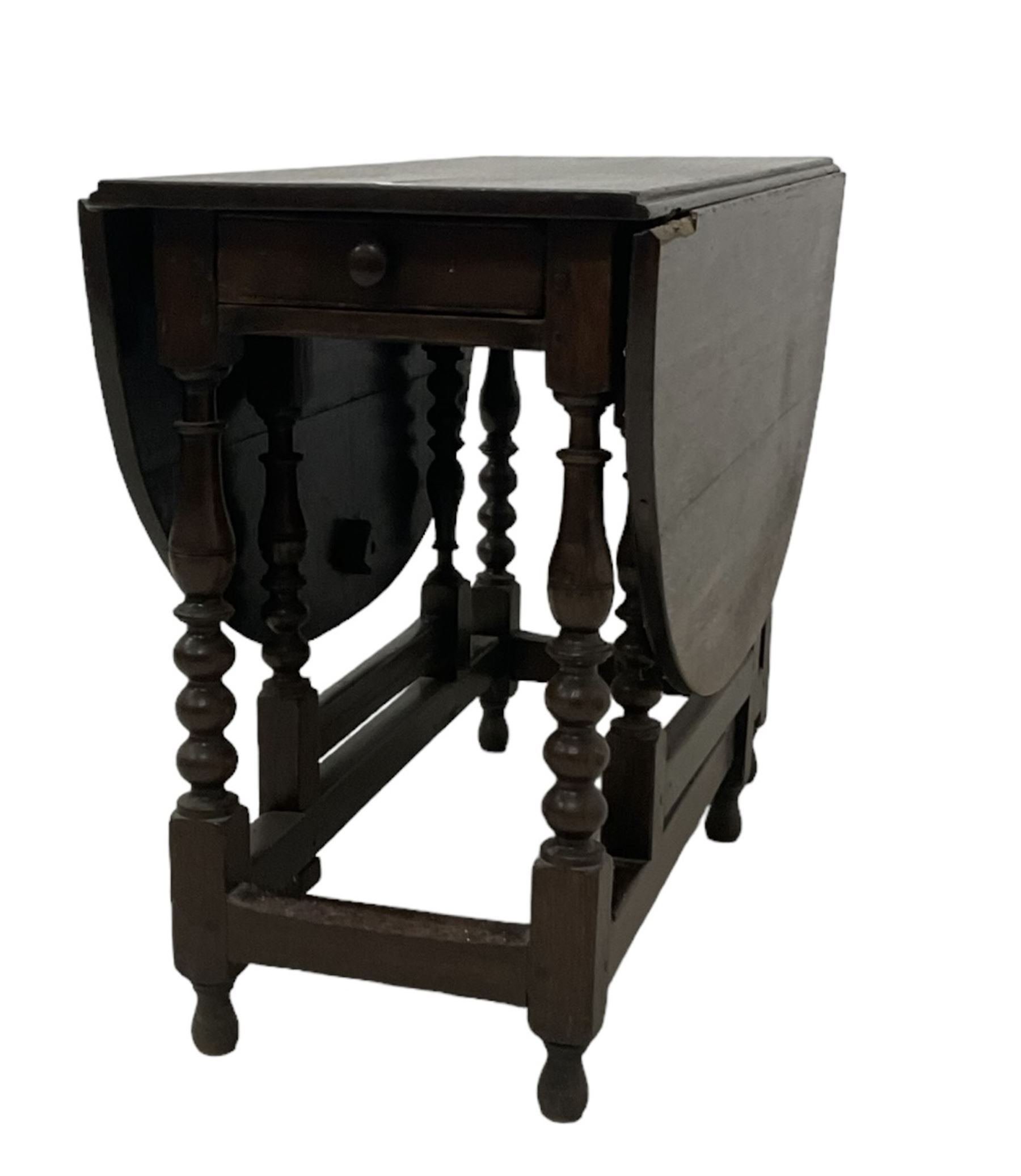 18th century country oak drop-leaf table, oval top, fitted with single drawer, raised on double gate-leg action bobbin-turned supports, united by stretchers