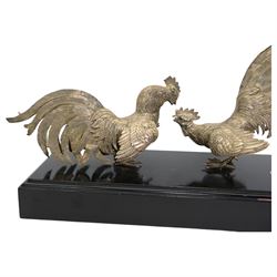 'The Northern Goldsmiths Sweepstakes 1975, Winner Aviator, Owner Guy Reed, Trainer Sam Hall' - A silver trophy modelled as two fighting cockerels on an ebonised plinth with plaque H24cm x W38cm import mark and makers mark for Israel Freeman & Son