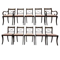 Set of ten (8+2) Regency design mahogany and brass inlaid dining chairs, bar cresting rail over x-framed back, upholstered drop-in seats, moulded frame and sabre supports 