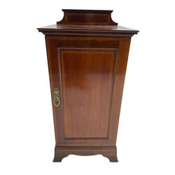 Edwardian inlaid mahogany bedside cabinet, enclosed by single panelled door, with feather banding, on shaped and splayed plinth base