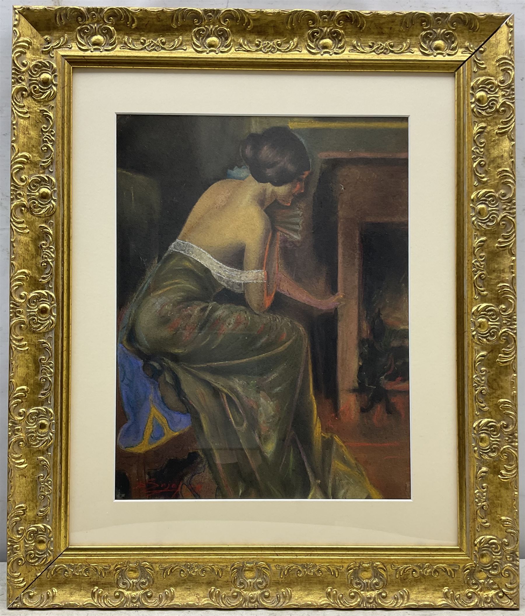 Delphin Enjolras (French 1857-1945): Lady Warming by the Fireside, pastel signed 39cm x 29cm