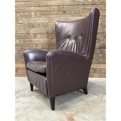 Wing back armchair upholstered in cocoa brown leather