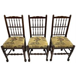 Set of six (4+2) 20th century oak spindle back dining chairs, with upholstered drop-on seat cushions, turned supports joined by turned stretchers