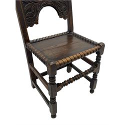 Set of three 18th century carved oak back stools, the cresting rail carved with scrolling foliate motifs over an arched panel with a stylised tree carving with extending leafage, the panelled seat held within a bobbin-turned frame, raised on turned supports united by a ring-turned front stretcher